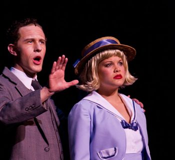 A male and female cast member of 42nd Street