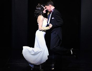Anything Goes a man and woman about to kiss