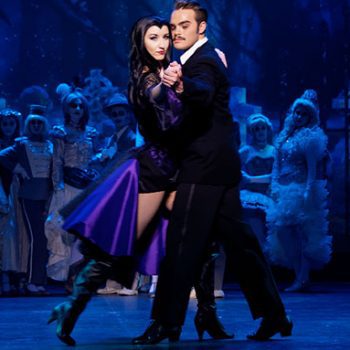 Gomez and Morticia Addams dancing at the Addams Family Musical