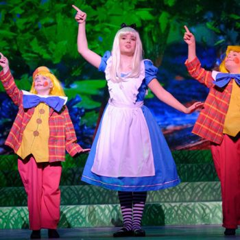 Alice and Tweedledum and Tweedledee from the El Dorado Musical Theatre production of Alice in Wonderland