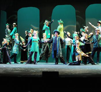 Citizens from the Emerald City from Wizard of Oz the Musical