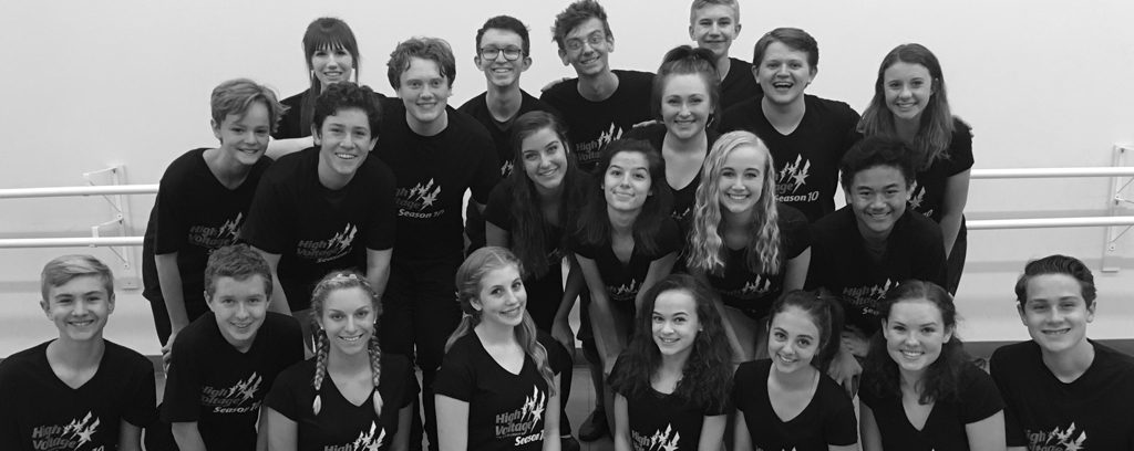 A black and white photo of a group of dancers.