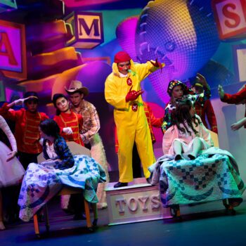 Colorful toy-themed stage musical with ensemble cast
